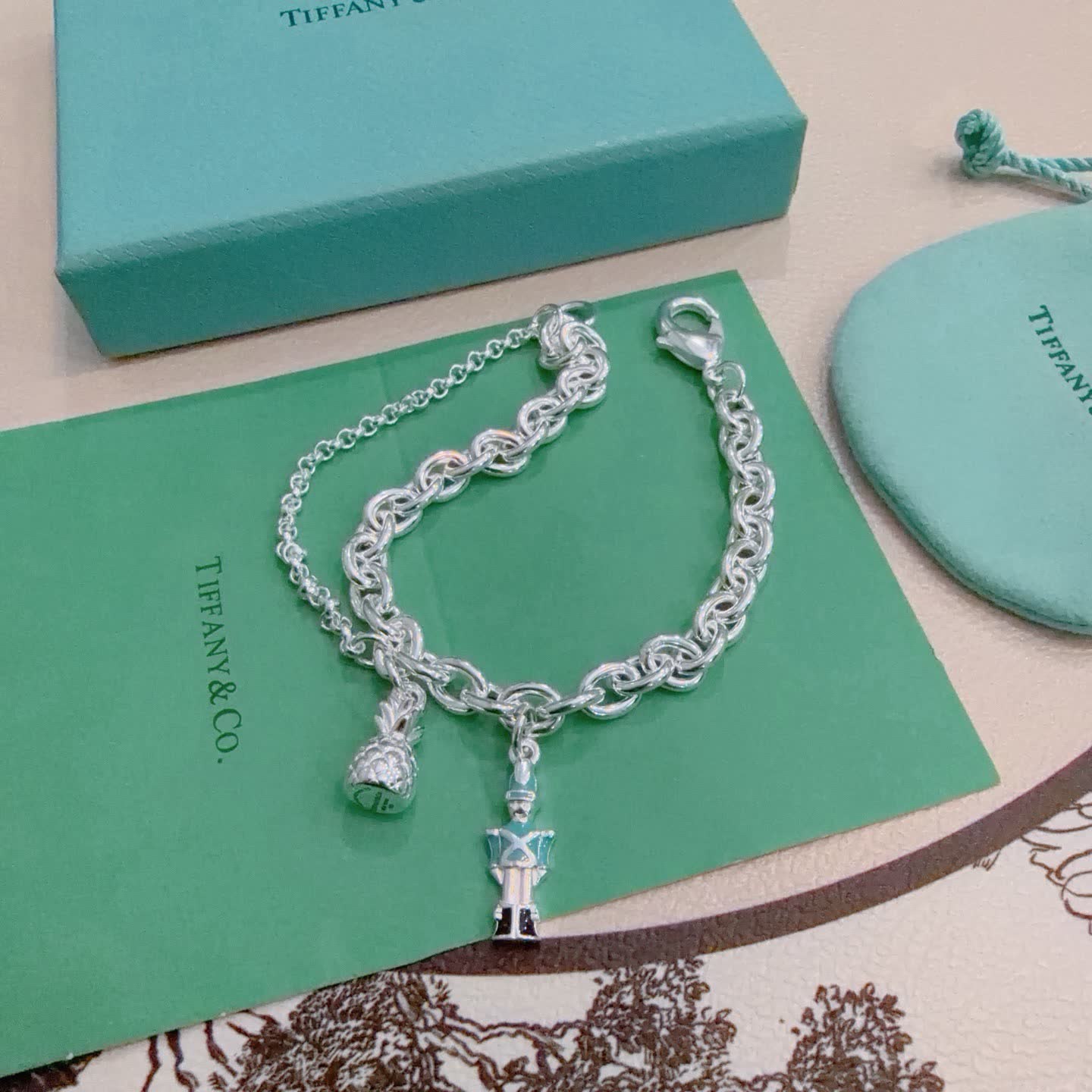 Tiffany & Co. Sterling Silver Link Bracelet with Charms